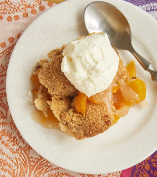 Ginger adds a bit of spice, and pecans contribute some crunch to this fantastic Ginger Pecan Peach Cobbler. - Bake or Break