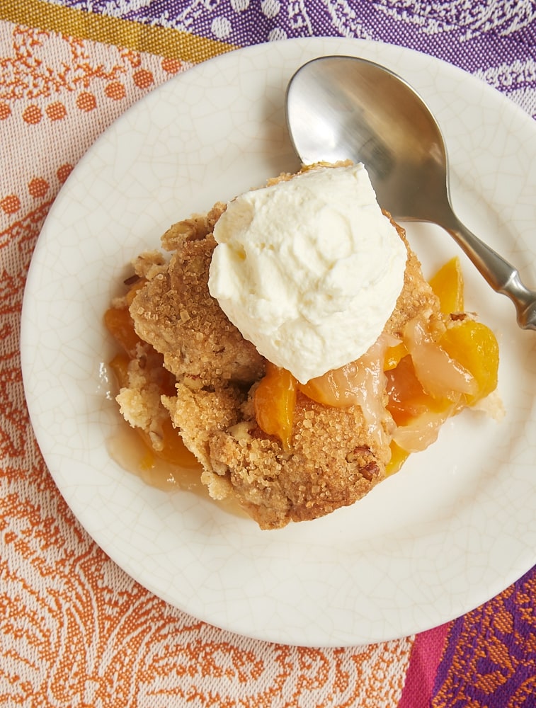 Ginger adds a bit of spice, and pecans contribute some crunch to this fantastic Ginger Pecan Peach Cobbler. - Bake or Break