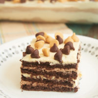 Chocolate Peanut Butter Icebox Cake features delicious layers of chocolate graham crackers, chocolate whipped cream, and peanut butter whipped cream. A quick and easy must-make for chocolate and peanut butter lovers! - Bake or Break