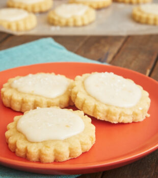 Peach Shortbread Cookies on an orange plate