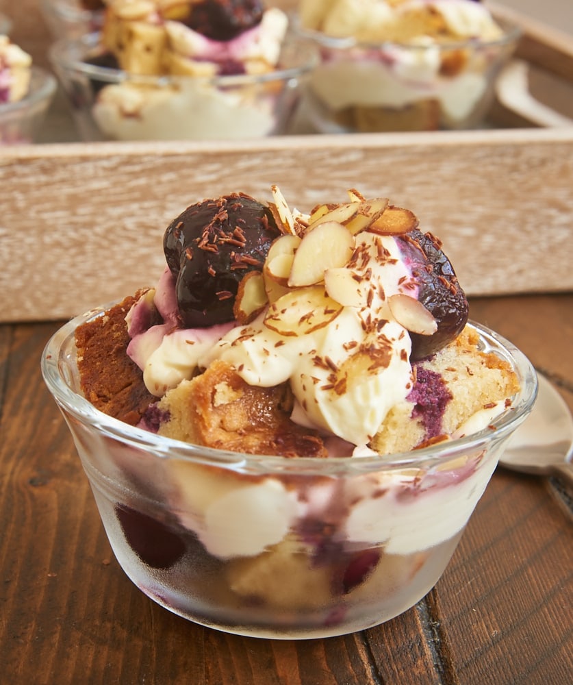 Layers of pound cake, cream cheese whipped cream, brandied cherries, nuts, and chocolate make these Brandied Cherry Trifles irresistible! - Bake or Break