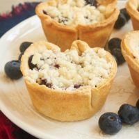Skip the slicing and serving with Mini Blueberry Cream Cheese Pies. Love that cream cheese surprise inside! - Bake or Break