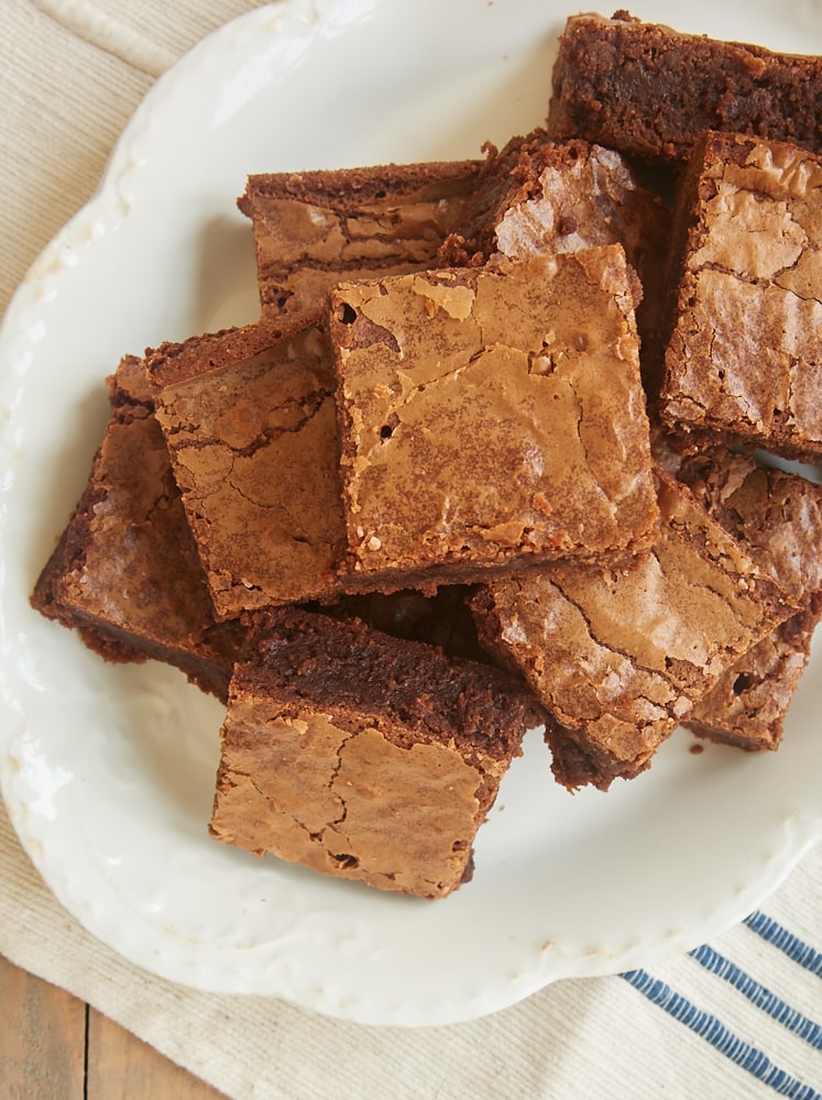 An overhead view of Milk Chocolate Brownies on a white plate