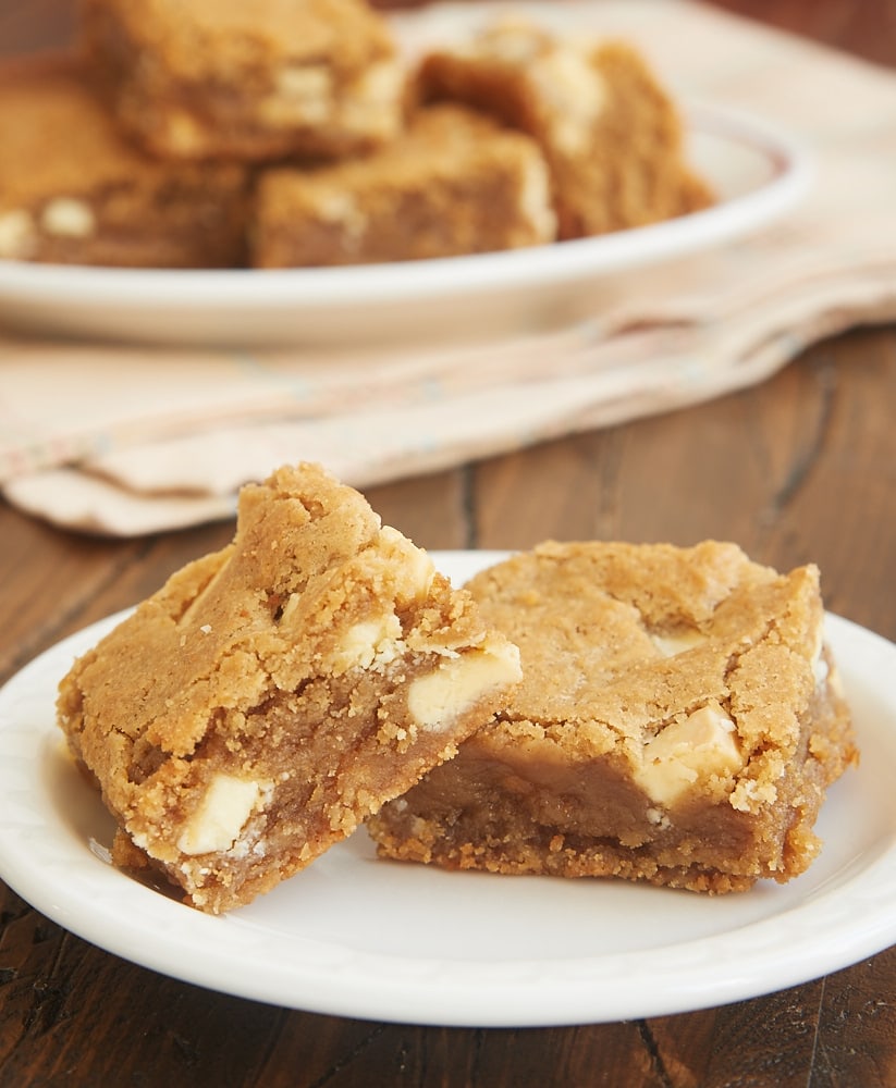 Peanut Butter White Chocolate Blondies on a white plate