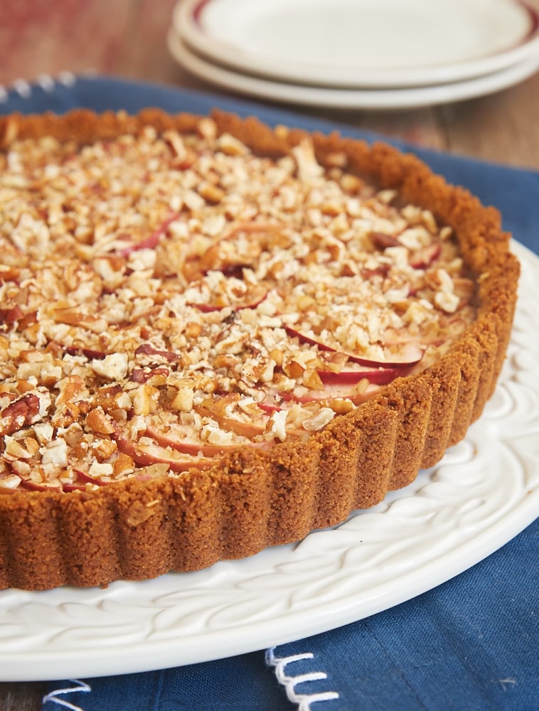 Apple Pecan Cream Cheese Tart is a delicious combination of apple pie and cheesecake. This lovely dessert is a fall baking must! - Bake or Break