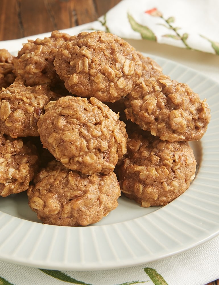 Apple Butter Oatmeal Cookies piled on a gray plate