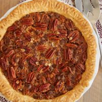 Classic pecan pie gets even better and more flavorful in this Chocolate Chip Coconut Pecan Pie! - Bake or Break