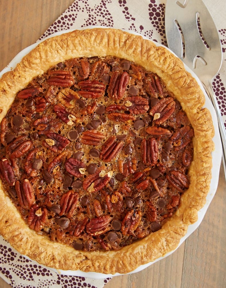 Homemade pecan pie in a pie dish.