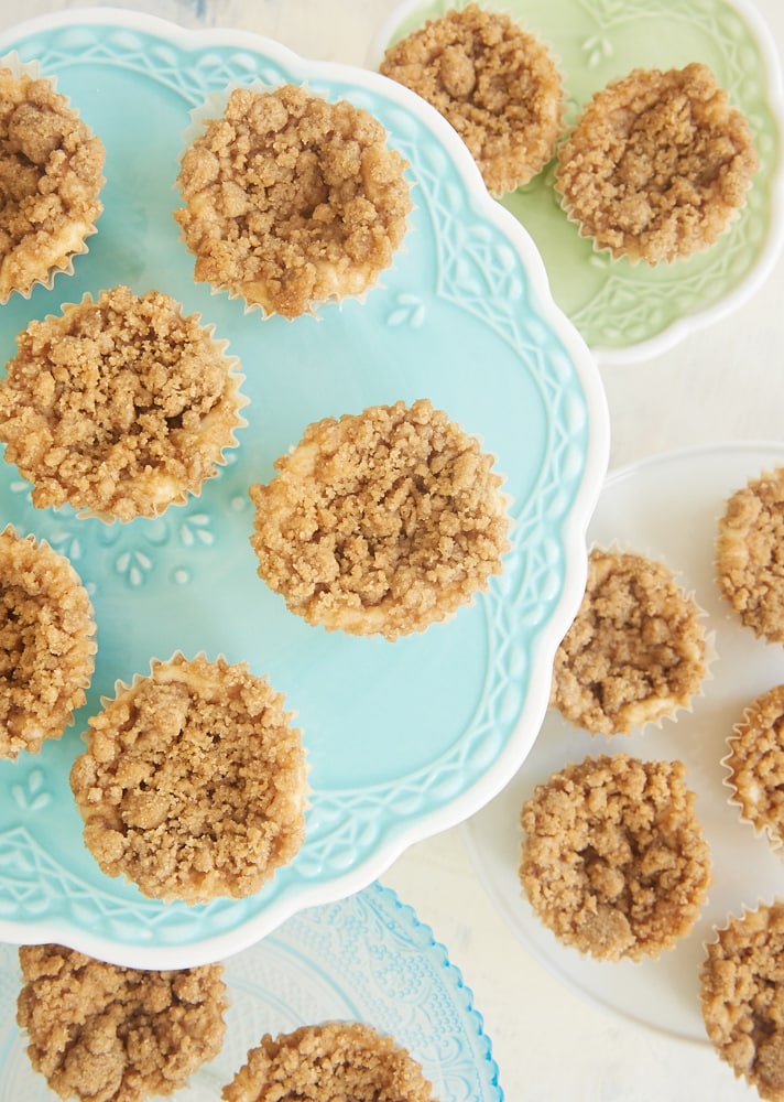 Mini Cinnamon Crumb Cheesecakes are bite-size treats full of fantastic cinnamon flavor.  - Bake or Break