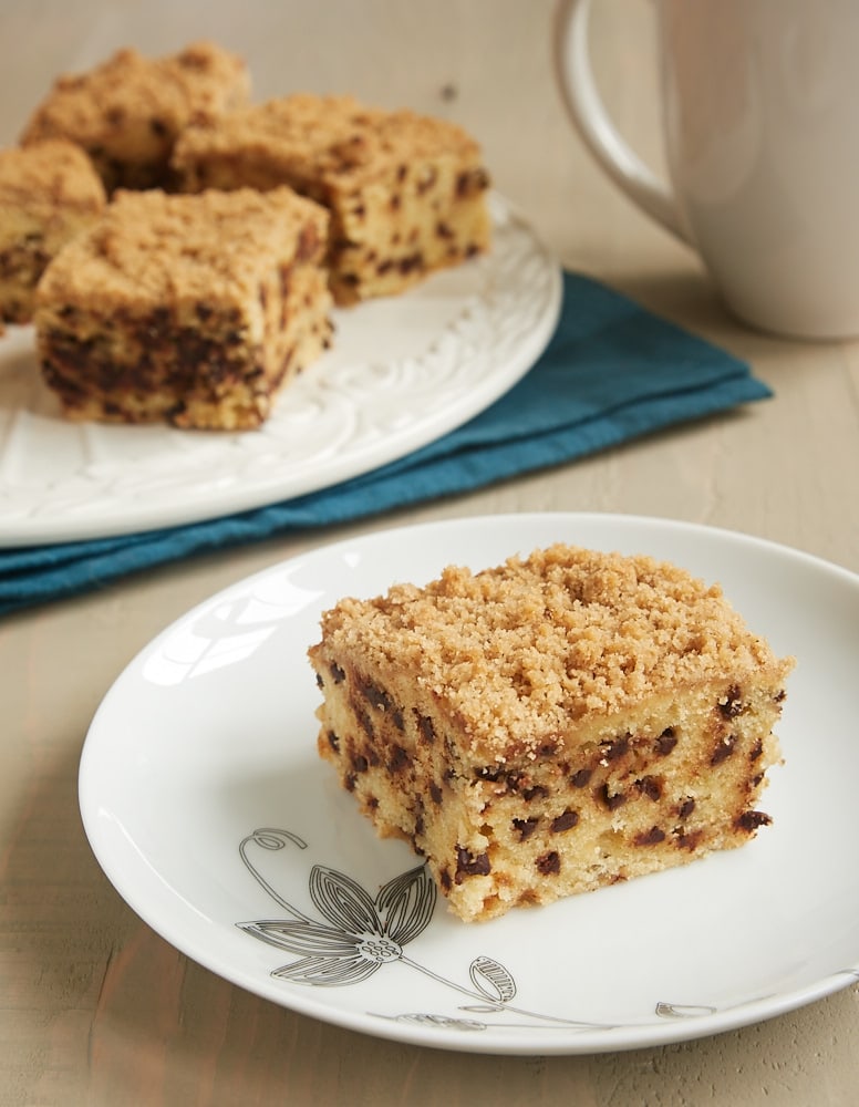 slice of Chocolate Chip Crumb Cake on a white plate