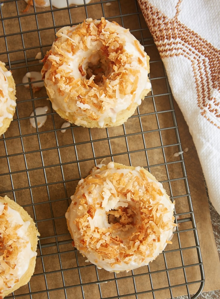 Toasted Coconut Cake Doughnuts on a wire rack