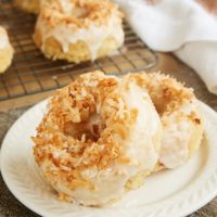 Toasted Coconut Cake Doughnuts served on a plate