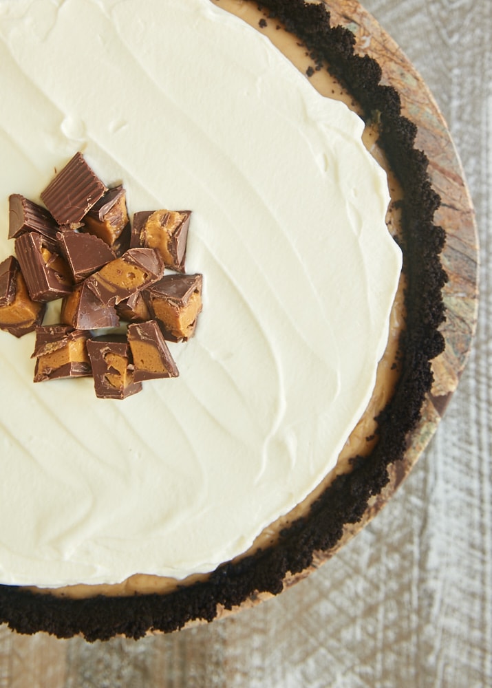 overhead view of Peanut Butter Pudding Pie on a brown marble pedestal