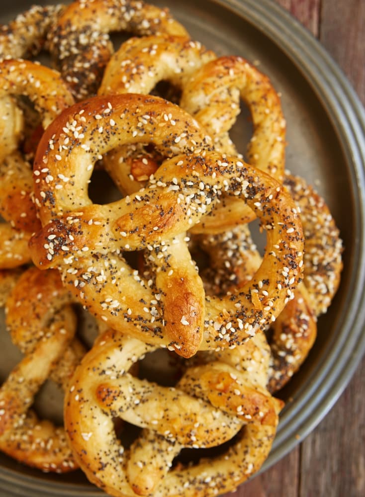 overhead shot of Everything Soft Pretzels on a round pewter tray