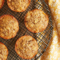 Pineapple Coconut Banana Nut Muffins cooling on a wire rack