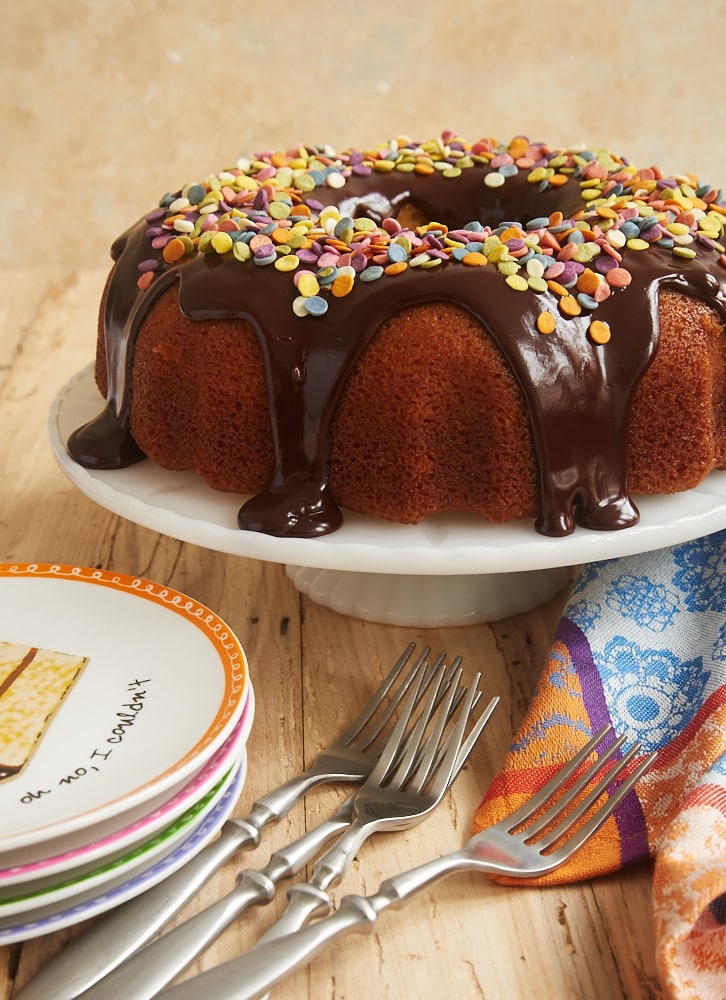 Yellow Bundt Cake with Dark Chocolate Ganache is one of my favorite celebration cakes, thanks to its crowd-pleasing flavors and ease of preparation. Just add sprinkles! - Bake or Break