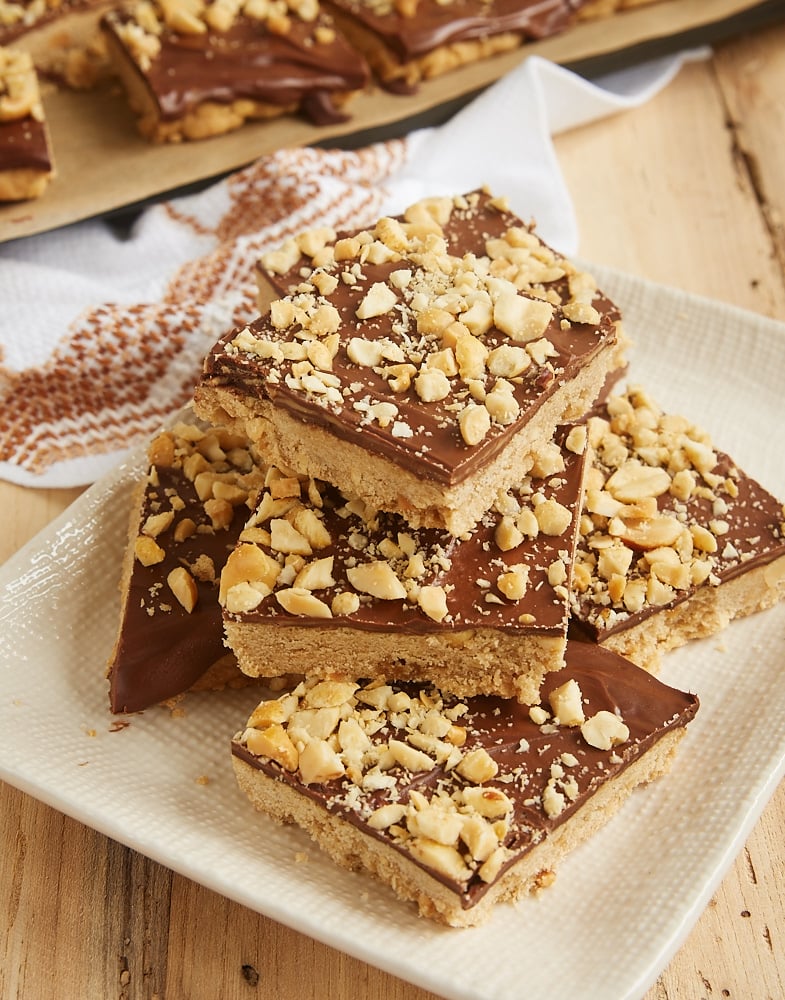 Chocolate peanut butter shortbread cookies topped with chopped peanuts.