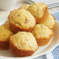 Coconut Almond Muffins combine wonderful flavors in a lightly sweet muffin. Perfect for a morning treat or an afternoon snack! - Bake or Break