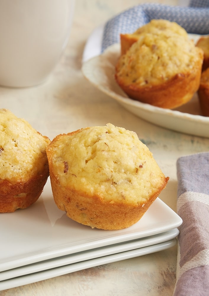 Coconut Almond Muffins on square white plates