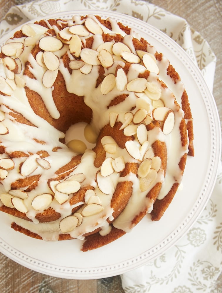 Amaretto Almond Bundt Cake topped with a sweet glaze and toasted almonds