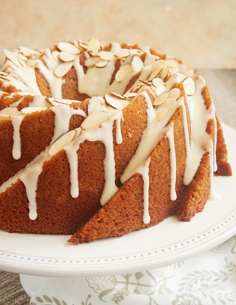 Amaretto Almond Bundt Cake topped with an almond glaze and sliced almonds