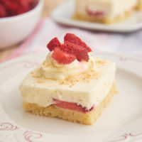 slice of Strawberry Shortcake Cheesecake Bars