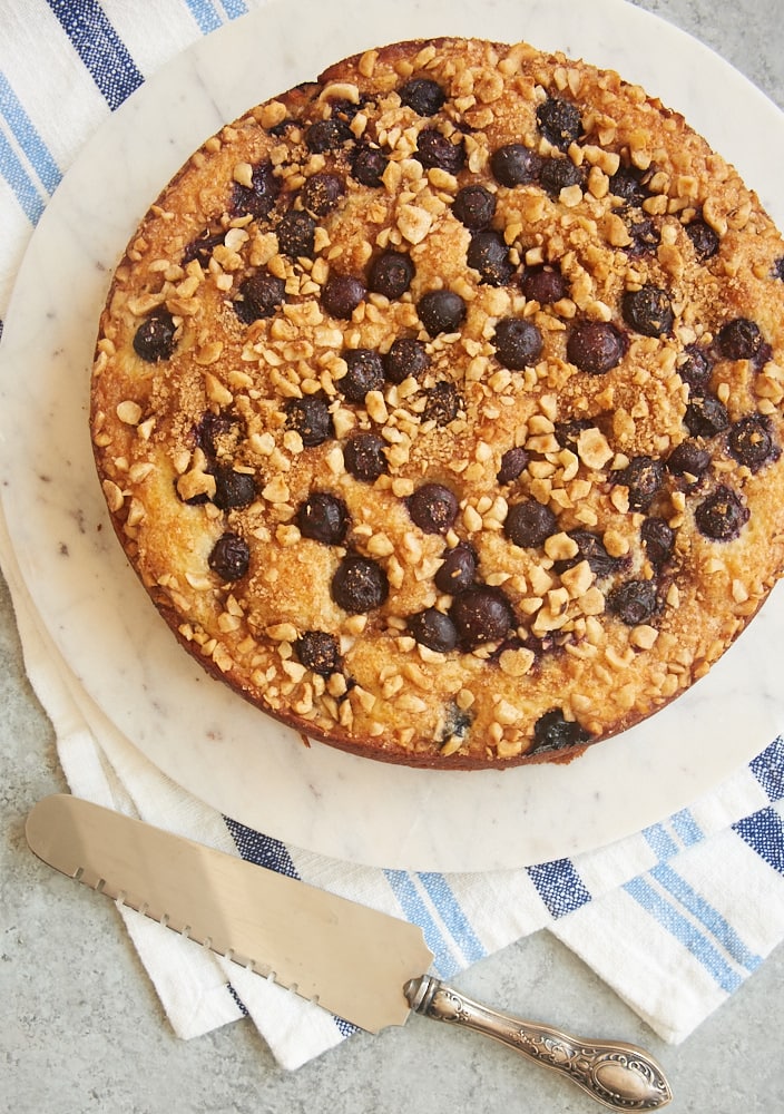 overhead view of Blueberry Coffee Cake on a round marble tray