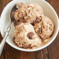 No-Churn Chocolate Peanut Butter Swirl Ice Cream features two fantastic ice creams swirled together along with a bevy of peanut butter cups. The flavor is amazing, and it is SO easy to make! - Bake or Break