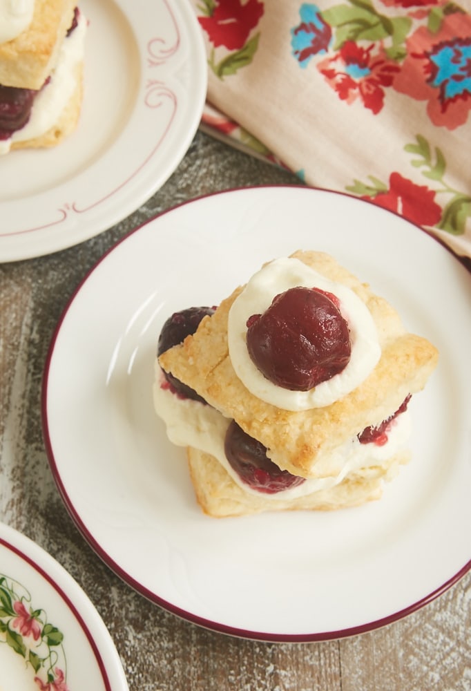 Sweet cherries, fluffy biscuits, and whipped cream combine for these delightful Cherry Shortcakes with Cream Cheese Biscuits. A summertime must! - Bake or Break