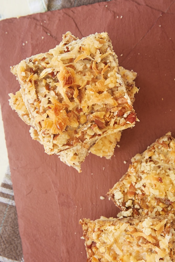 Pecan shortbread bars with shaved coconut on top.