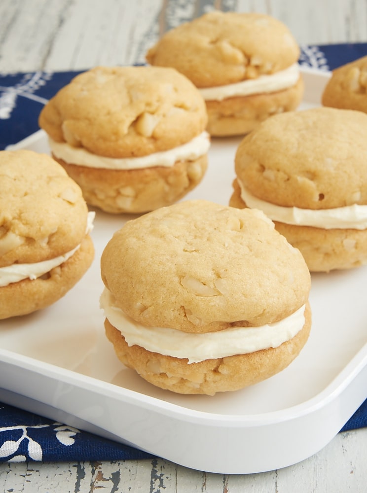 White Chocolate Macadamia Sandwich Cookies on a white tray