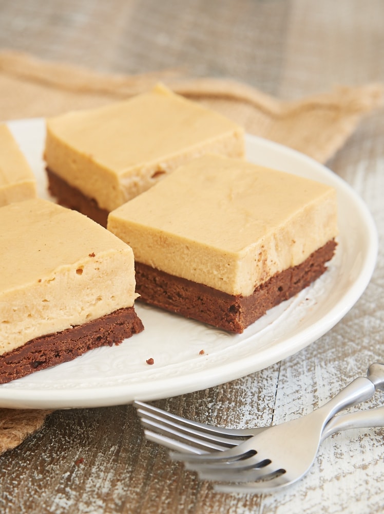 alices of Brownie Bottom Peanut Butter Pie Bars on a white plate