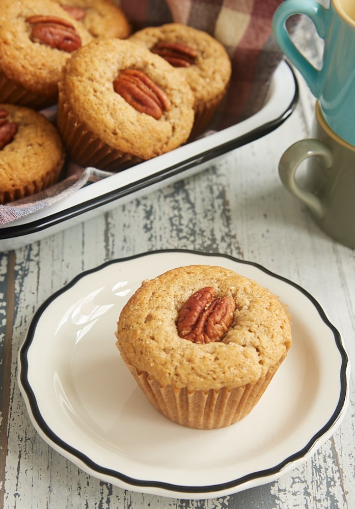 Brown Butter Sour Cream Spice Muffins on a white plate