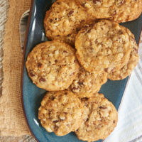 overhead view of Chocolate Chip Date Nut Cookies on a long blue tray