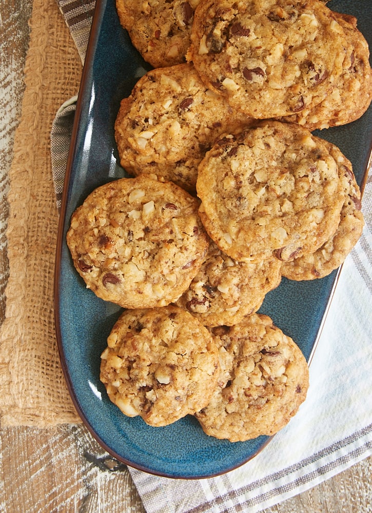 overhead view of Chocolate Chip Date Nut Cookies on a long blue tray