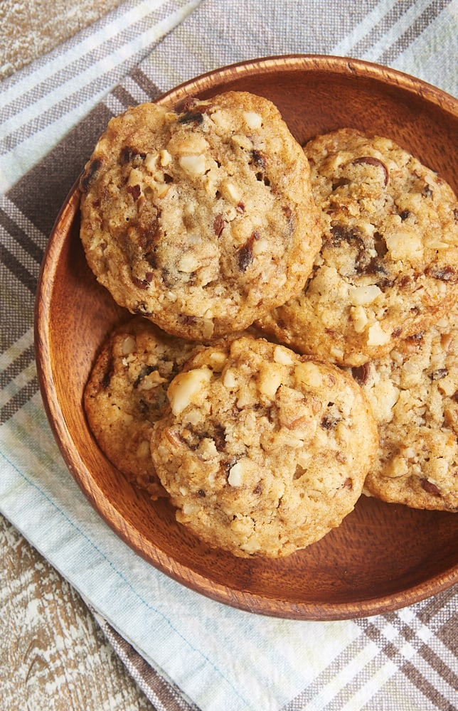 overhead view of Chocolate Chip Date Nut Cookies on a round wooden plate