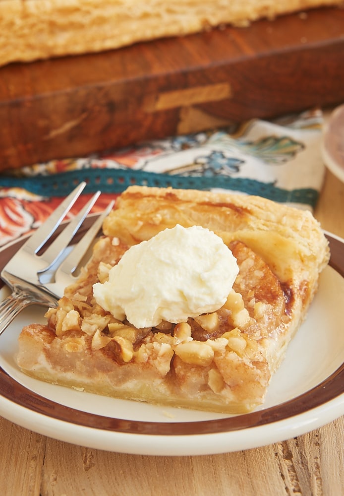 Cream Cheese-Filled Pear Tart is that perfect combination of easy to make and wonderfully delicious. A go-to recipe when I need a simple dessert that's sure to please! - Bake or Break