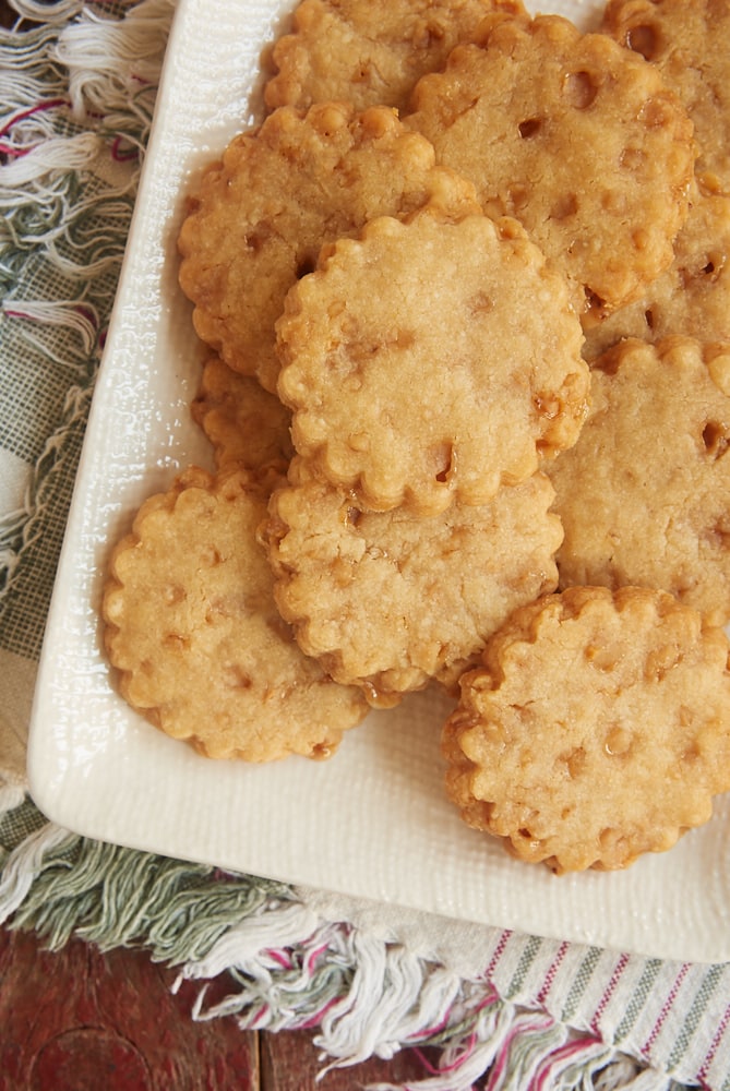 Brown sugar toffee shortbread served on a textured white plate.