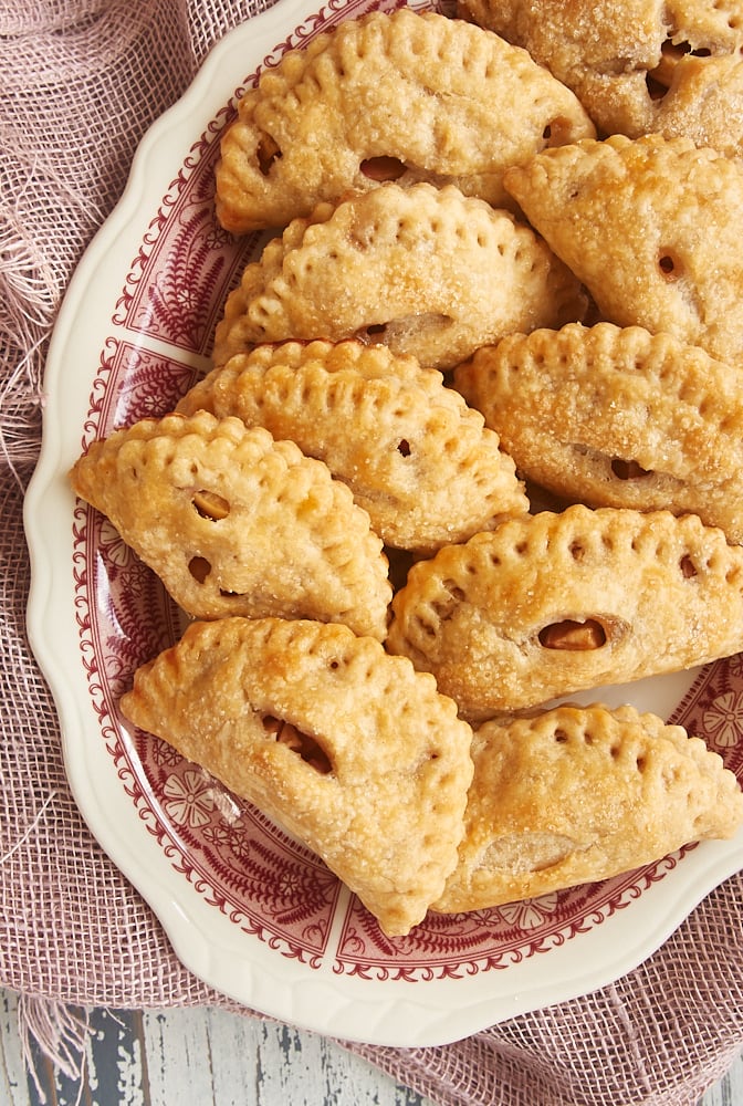 Cinnamon Apple Hand Pies on a red transferware serving plate