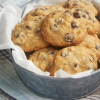 These Hazelnut Chocolate Chip Cookies are packed with plenty of chocolate chips, hazelnuts, and a special adults-only ingredients for some seriously amazing flavor. - Bake or Break