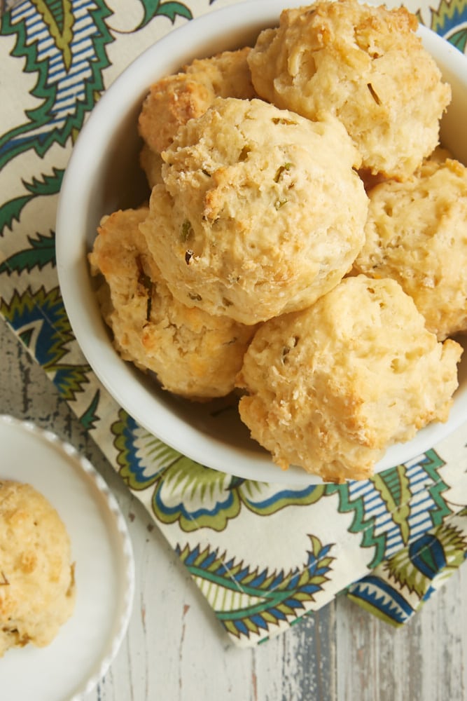 Sour Cream and Chive Biscuits combine the tang of sour cream biscuits with the great flavor of fresh chives for a wonderful quick and easy dinner bread. - Bake or Break