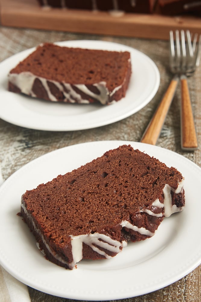 Chocolate sour cream pound cake topped with vanilla glaze