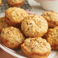 Oat Muffins with Nuts and Seeds served on an oval white plate