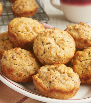 Oat Muffins with Nuts and Seeds served on an oval white plate