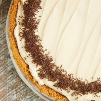 No-Bake Irish Cream Cheesecake garnished with chocolate sprinkles