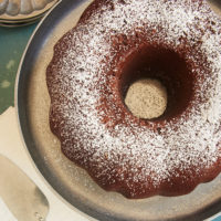 overhead view of Buttermilk Mexican Chocolate Pound Cake dusted with confectioners' sugar