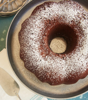 overhead view of Buttermilk Mexican Chocolate Pound Cake dusted with confectioners' sugar