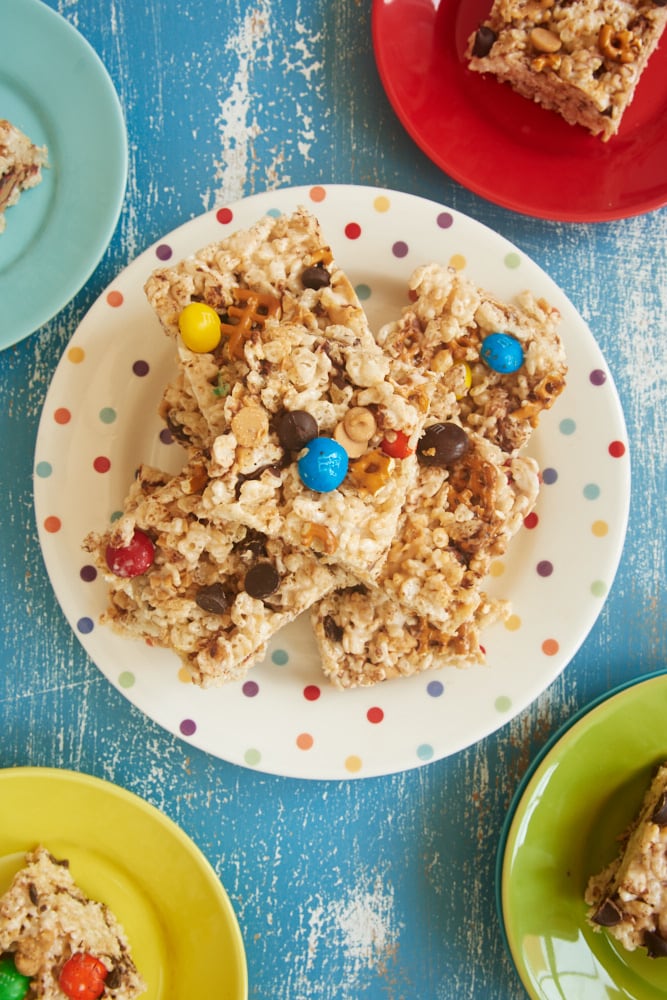 Kitchen Sink Rice Crispy Treats stacked on a plate