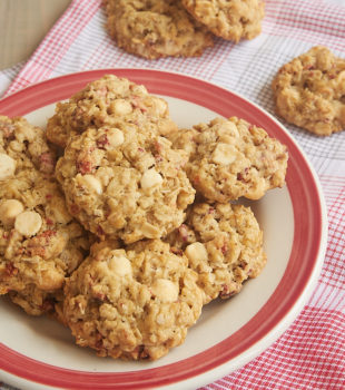 Strawberry White Chocolate Oatmeal Cookies on a red-rimmed plate