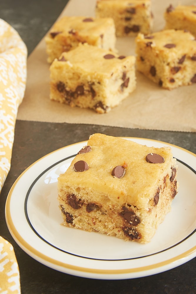 Chocolate Chip Banana Bar on a white plate with yellow and black trim